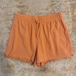 Kids' Orange Ruffle Hem Shorts